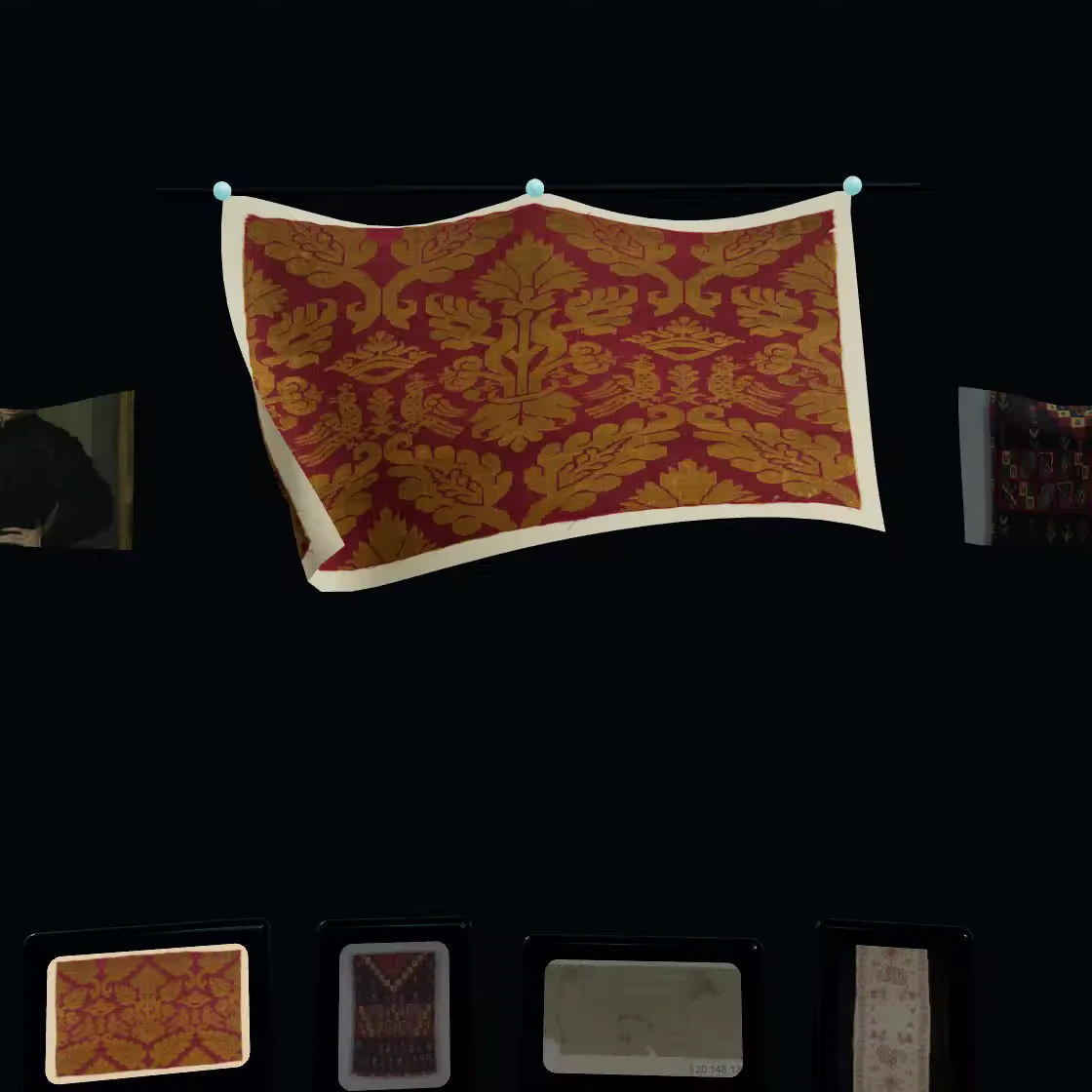 A woven textile hanging from a line, drifting in simulated air